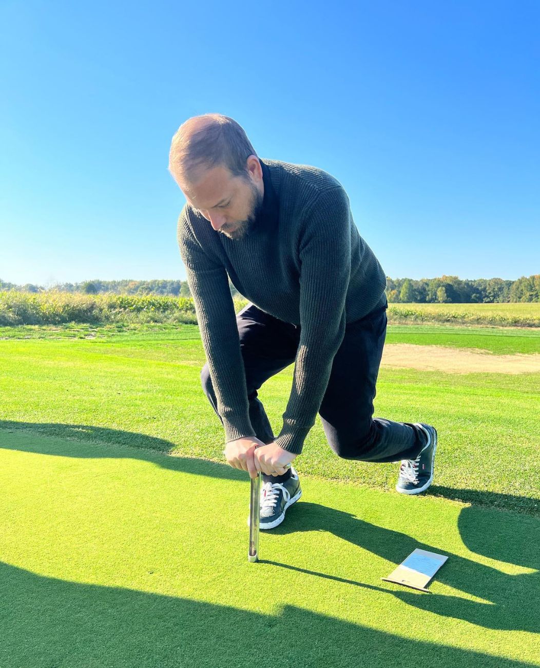 team member at golf course